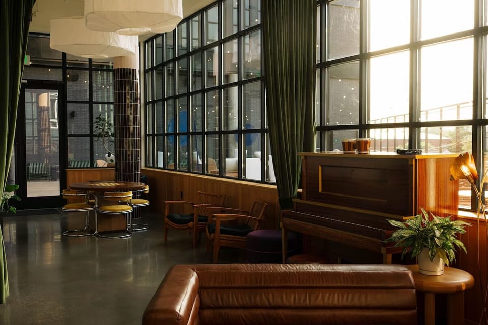 Gather with friends in a bright loft-style lounge setting.