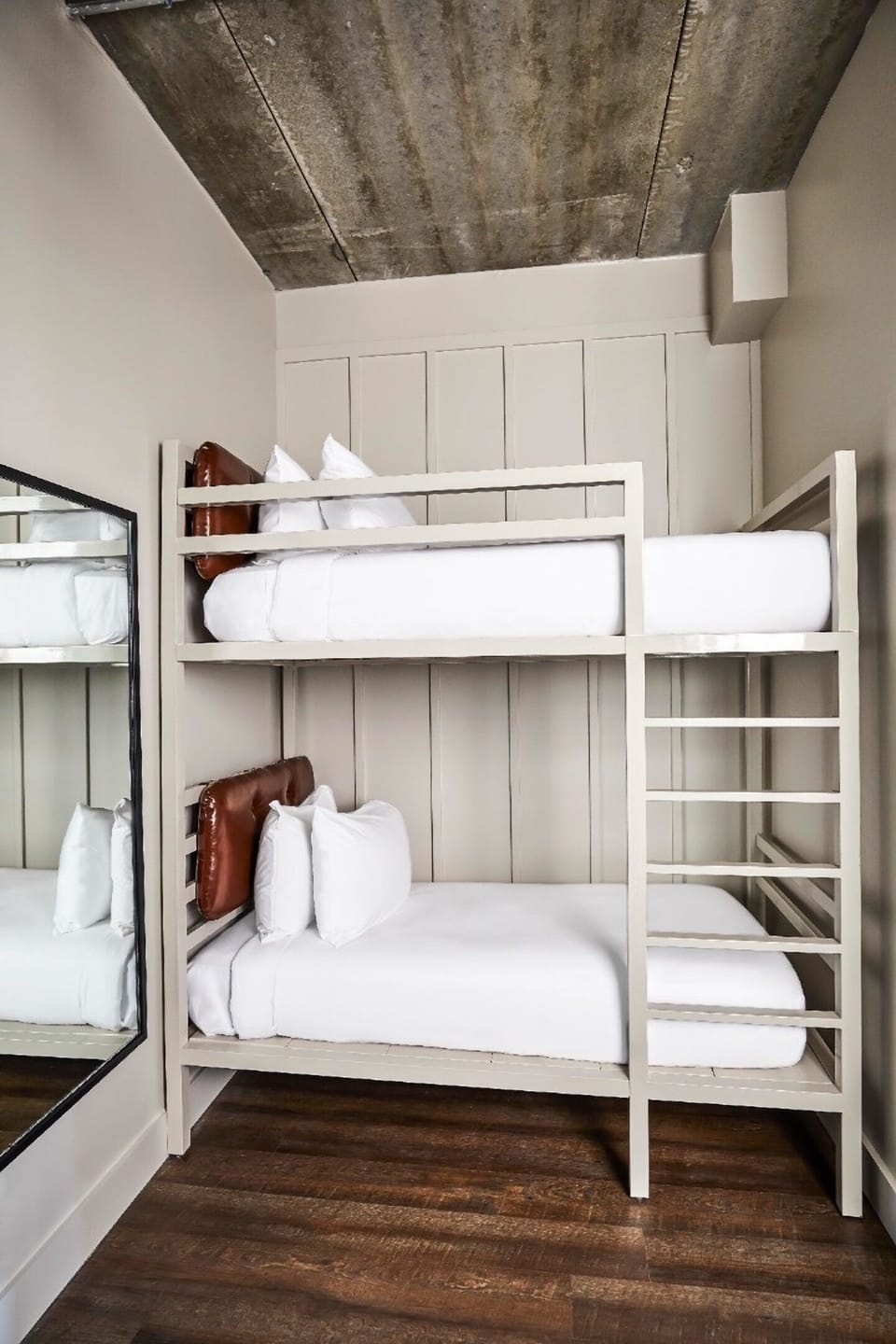 Sleep soundly in cozy bunks with crisp hotel linens.