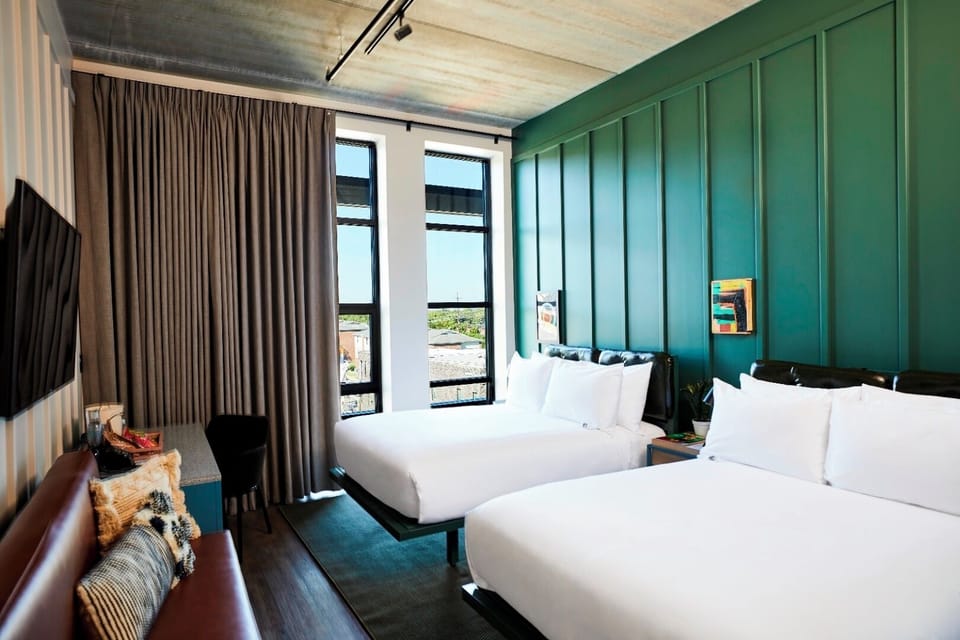 Gather everyone in a bright double-queen room with views.