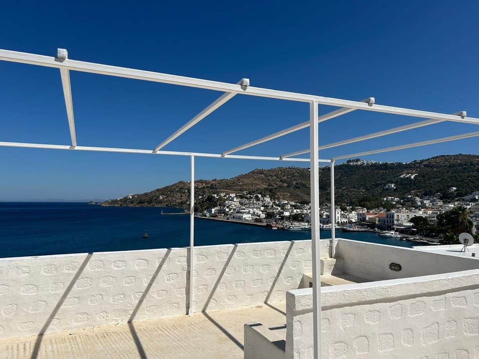 Terrace view of port,Skala and Hora