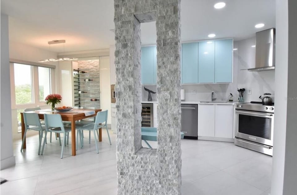 Open-concept living room, dining and kitchen