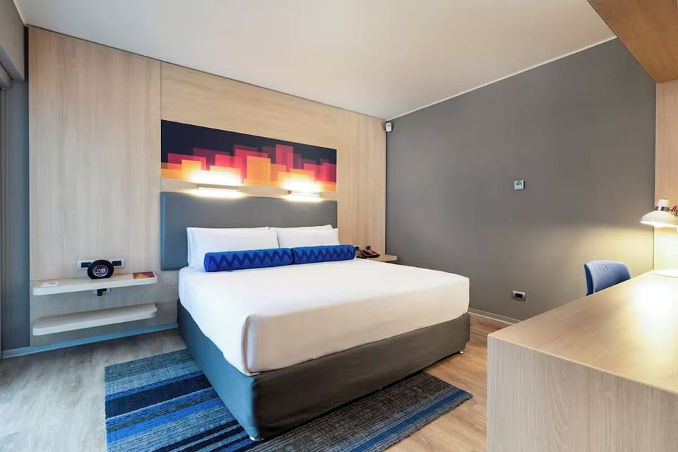 Recharge in a bright, minimalist room made for deep sleep.