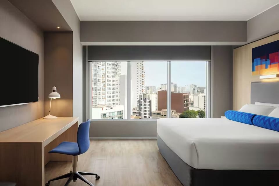 Stretch out and savor skyline daylight through wide picture windows.