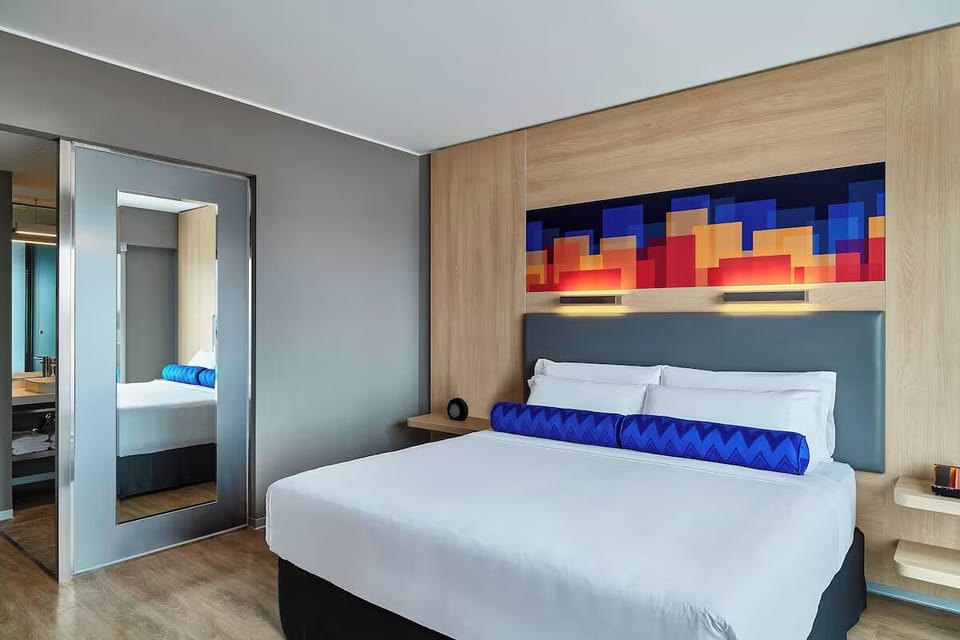 Settle in with a spacious bed and sleek mirrored closet.