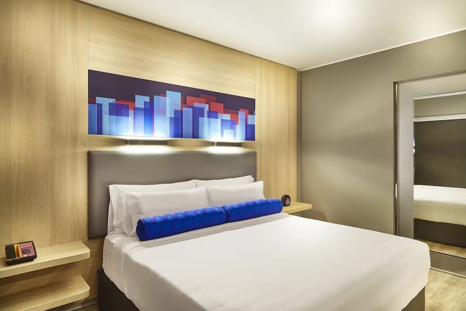 Relax after exploring with a cozy room and bright outlook.