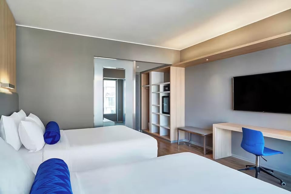 Unwind with a movie, then catch up at the dedicated desk.
