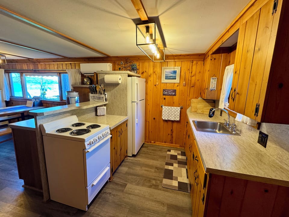 The kitchen with a lake view.  This will be remodeled in 2027.