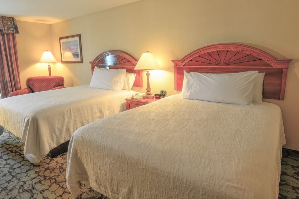 Spread out comfortably with two beds and warm bedside lighting.