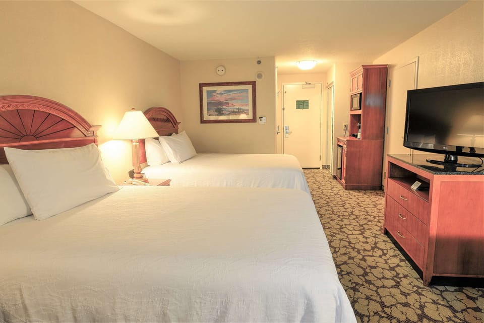 Settle into crisp beds and enjoy a relaxing movie night.