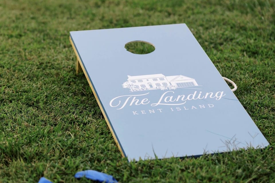 Outdoor games including corn hole, croquet, and boccee.