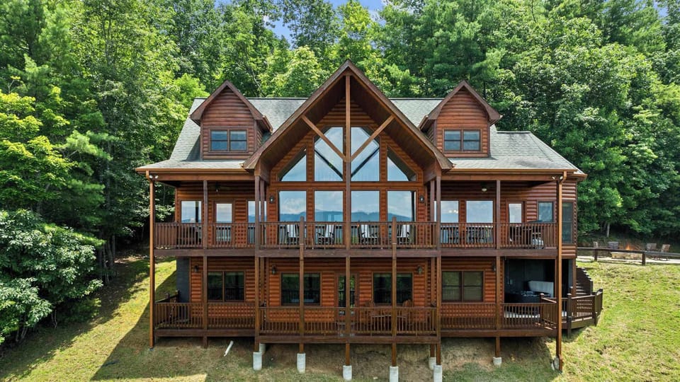 Spread out and soak it all in—this stunning 3-level home features wraparound decks on every floor, giving you panoramic mountain views from every angle! 