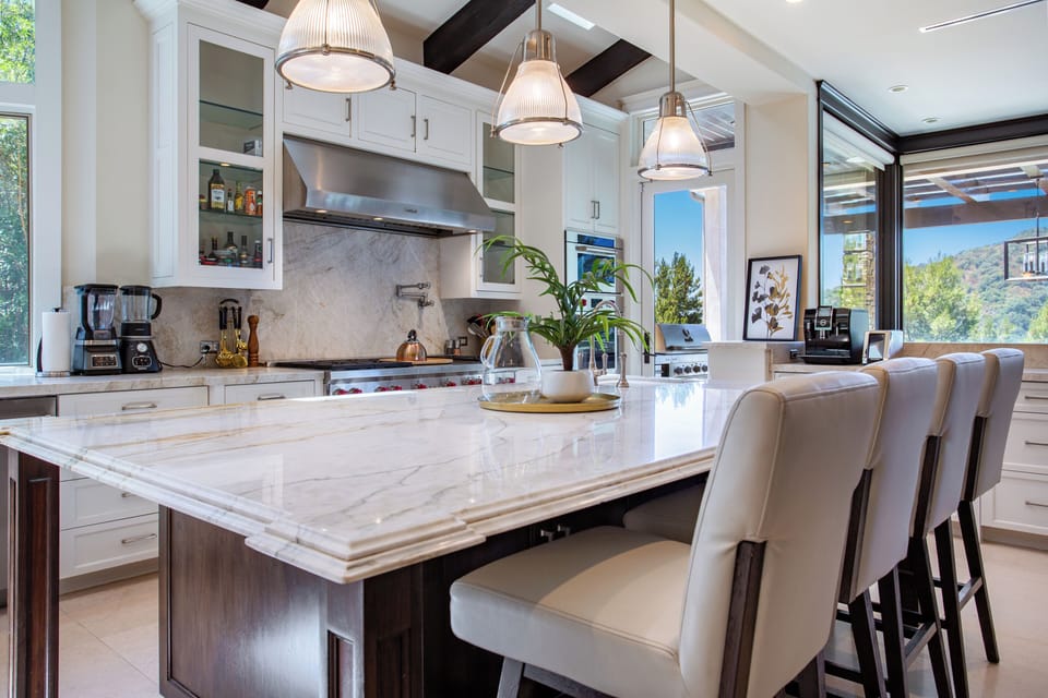 Modern kitchen interior featuring sleek appliances, clean lines, and stylish finishes—perfect for cooking and gathering.