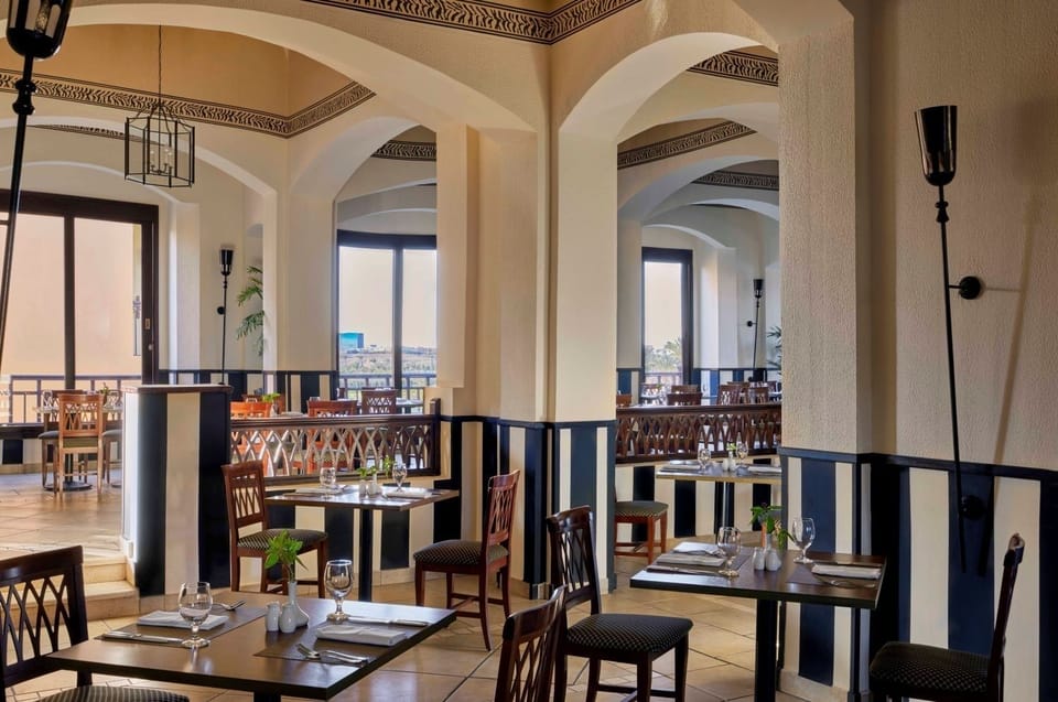 Choose your perfect table while sunlight streams through tall windows.