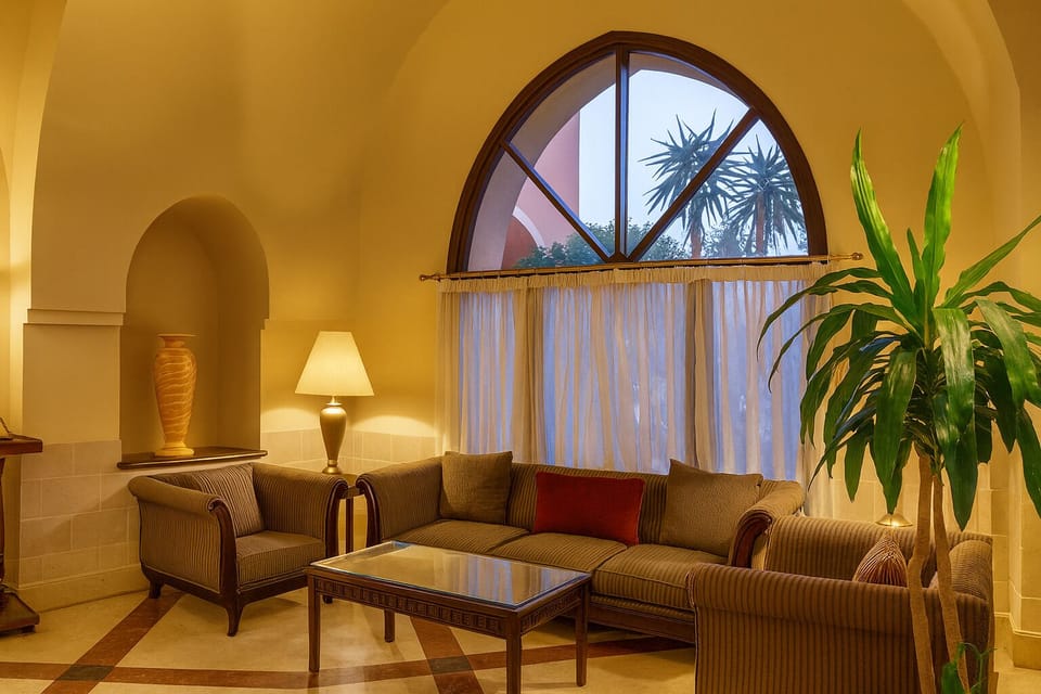 Unwind on plush sofas with soft light and calm vibes.