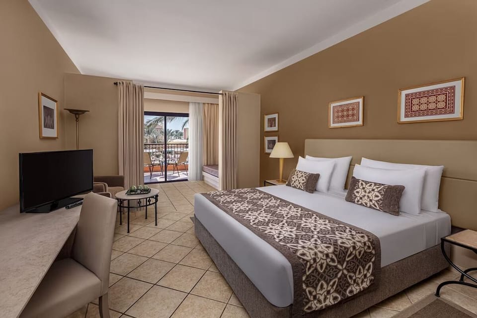 Wake up to soft light and an easy balcony escape.