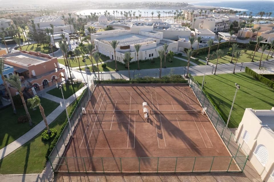 Serve up fun with full-size courts and sweeping resort views.