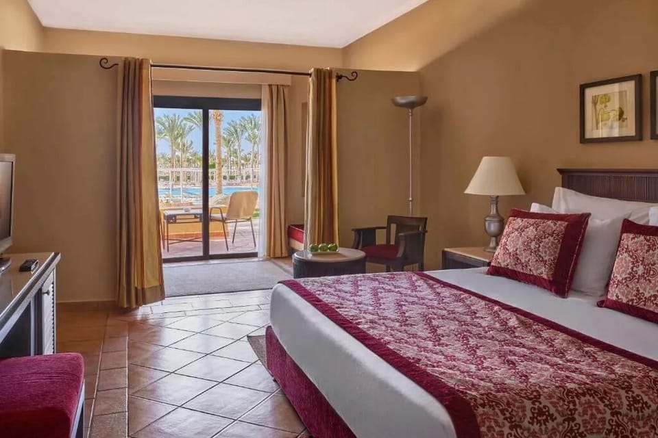 Recharge in a warm, elegant room with terrace access.