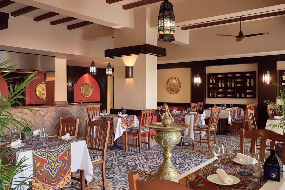 Experience vibrant local flavors amid richly patterned, elegant décor.