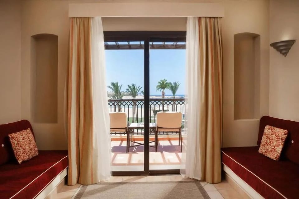 Sip sunset drinks on the balcony from a serene lounge nook.