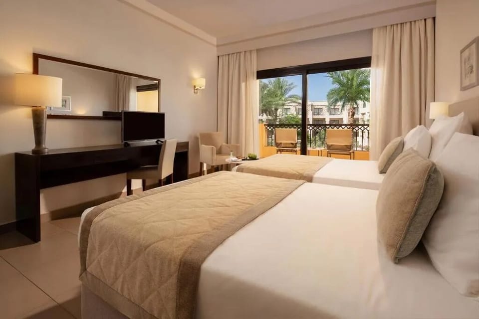 Recharge in a bright room with calming neutral tones.