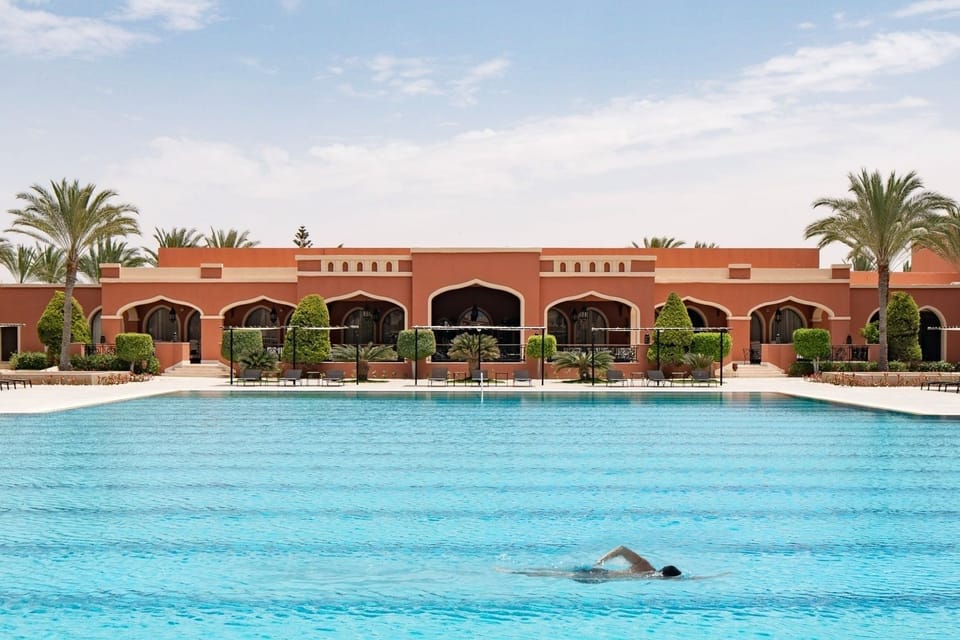 Swim slow laps in sparkling water under open skies.