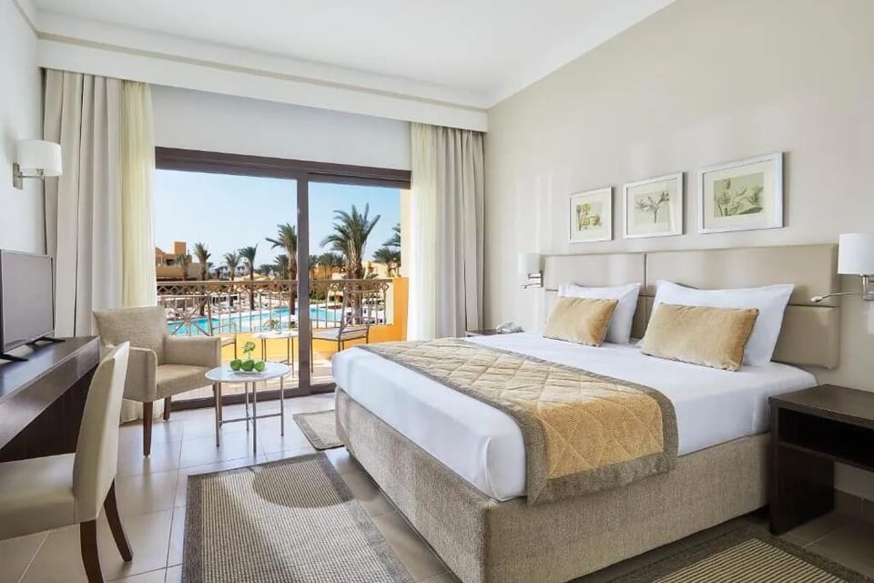 Wake up to pool views from your private balcony retreat.