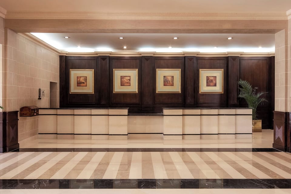 Arrive with ease at the elegant, welcoming reception desk.