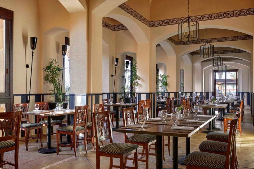 Start mornings in a grand hall with airy, sunlit views.