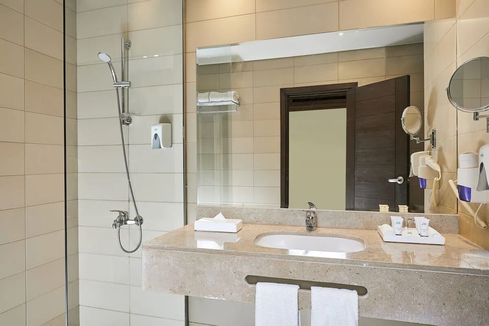 Refresh in a bright, spotless bath with walk-in shower.