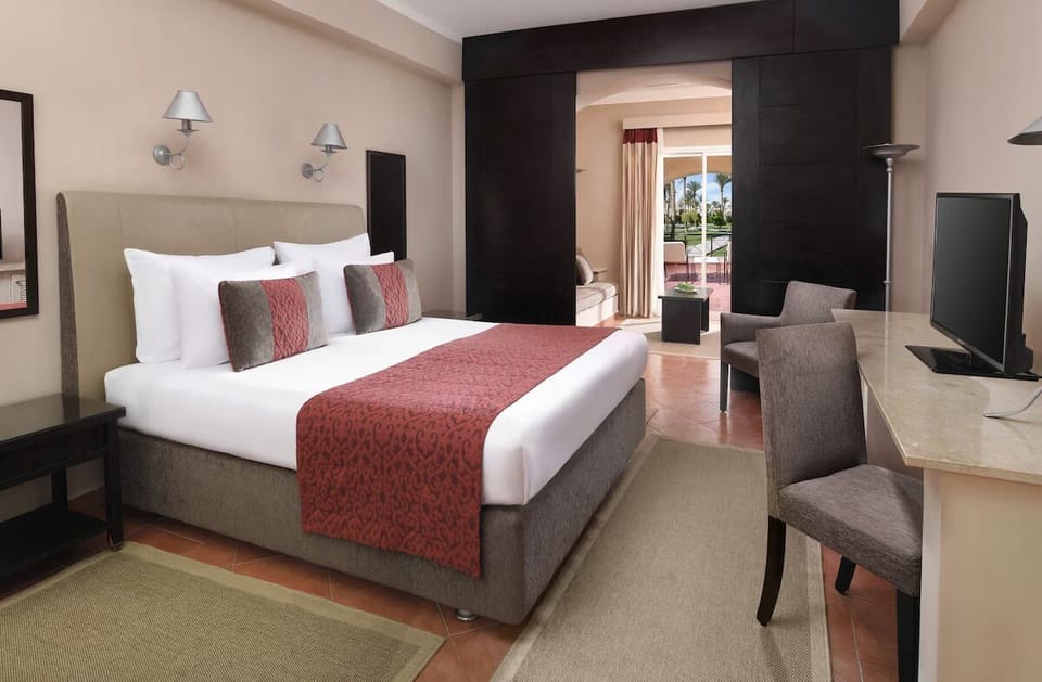 Relax in a spacious suite layout with cozy seating nook.