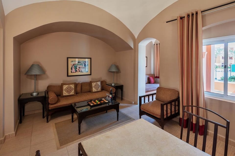 Living area. Exact unit will be assigned upon arrival. Views, colors, and decor may vary.