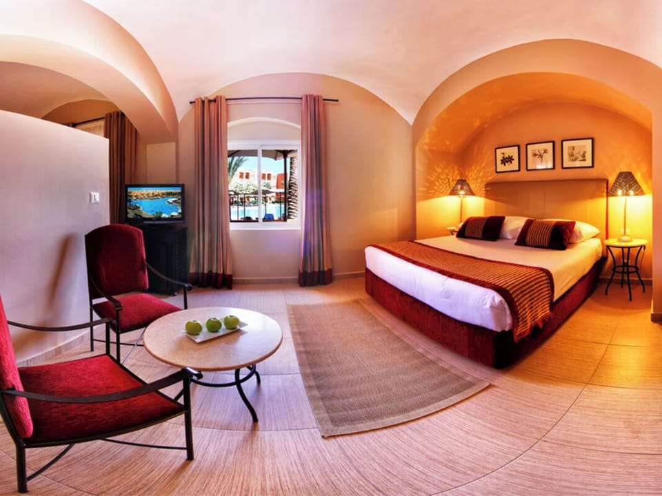 Unit with Queen bed. Exact unit will be assigned upon arrival. Views, colors, and decor may vary.
