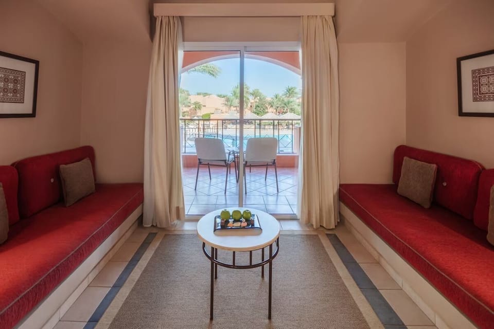 Stretch out in a spacious lounge framed by garden views.