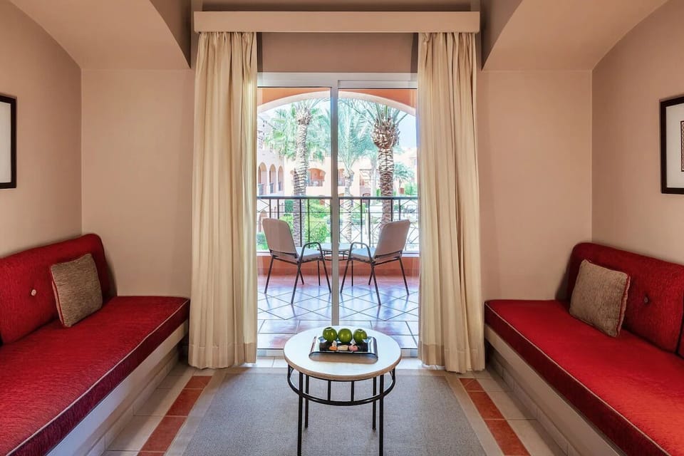 Living area. Exact unit will be assigned upon arrival. Views, colors, and decor may vary.