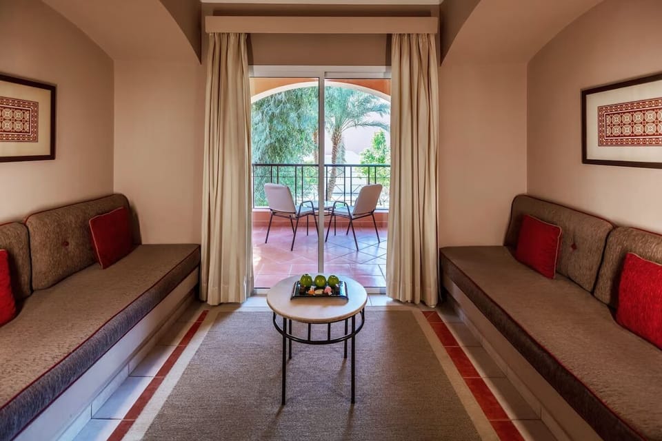Living area. Exact unit will be assigned upon arrival. Views, colors, and decor may vary.