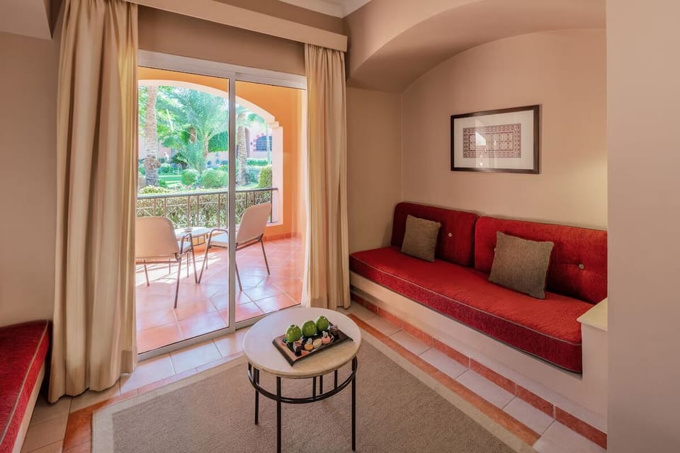 Living area. Exact unit will be assigned upon arrival. Views, colors, and decor may vary.