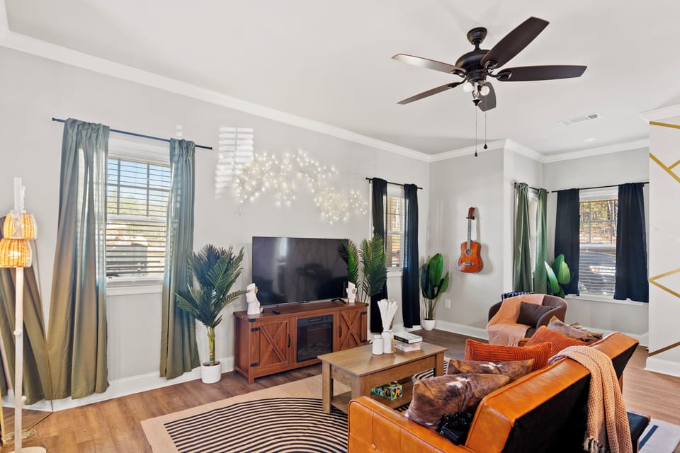 Settle in for unforgettable movie nights with a smart TV and a cozy sofa