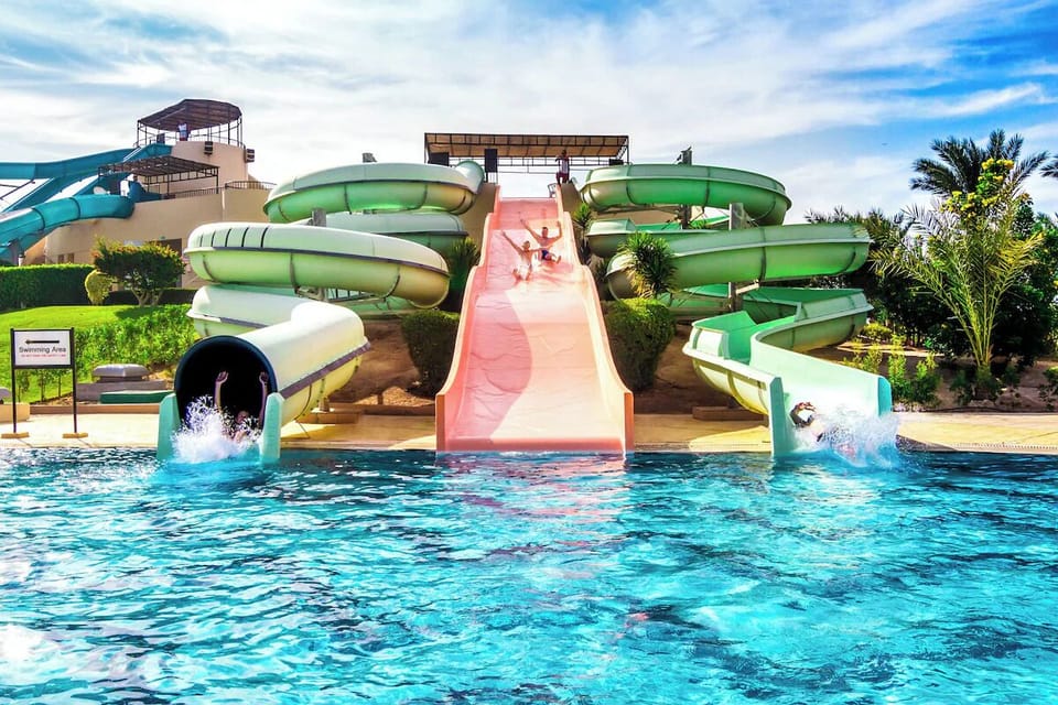 Dive into thrilling slides and splash down together, laughing nonstop.