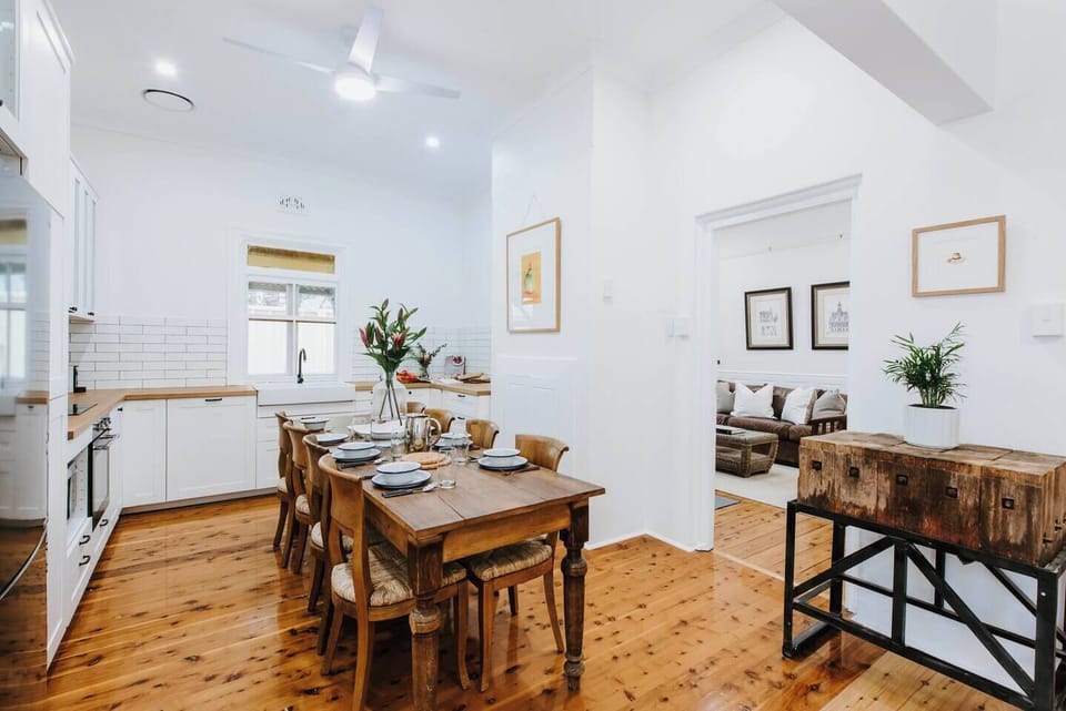 Come together in the main house around a large country-style dining table.
