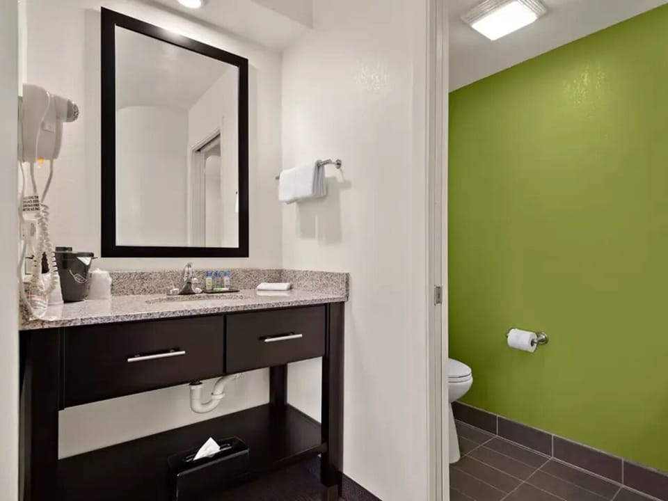 Refresh and reset with a clean, modern vanity area.