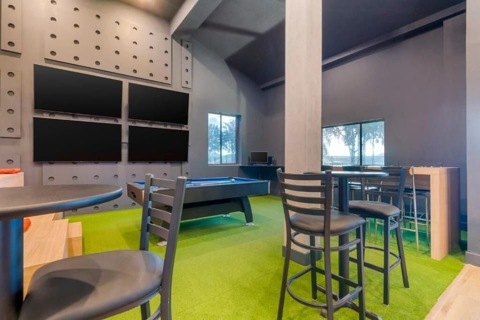 Relaxing lounge space featuring a pool table