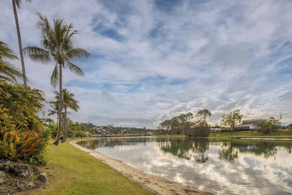 Panoramic water views stretch out from the rear of the property, offering a constant sense of peace and connection to nature.