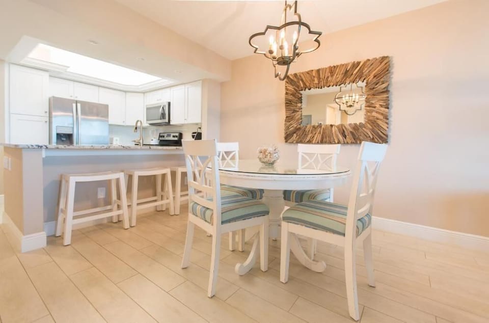 Gather for easy meals in the airy kitchen and dining nook