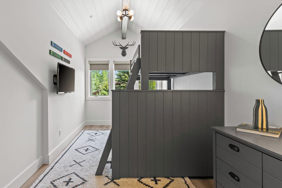 The third bedroom offers a twin over queen size bunk bed.