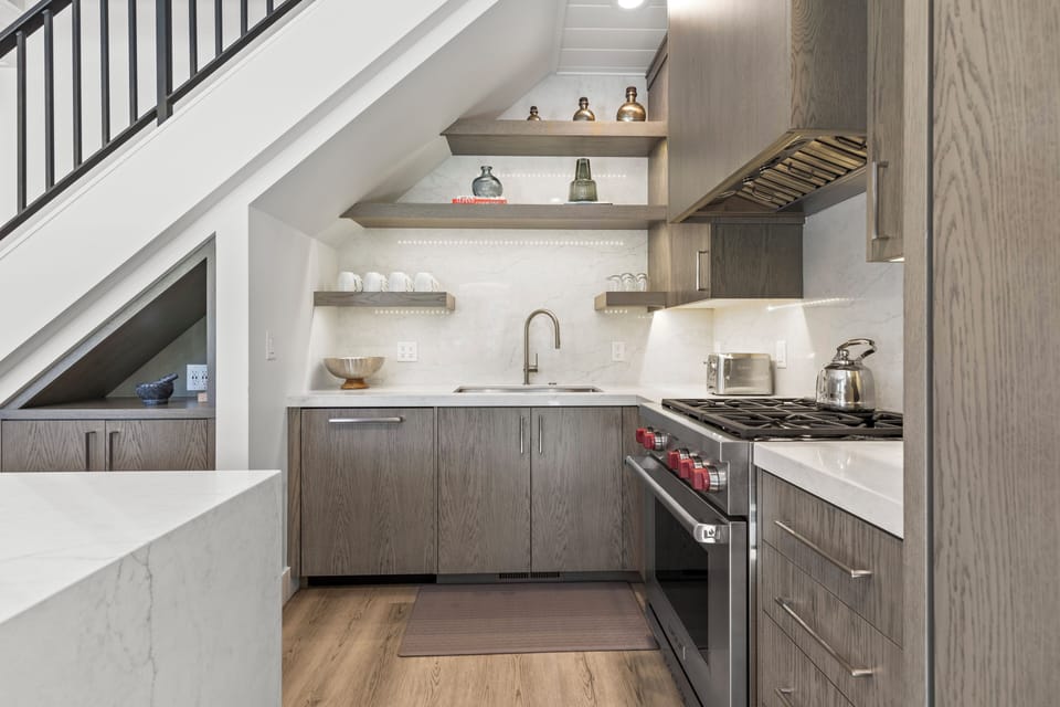 The well equipped kitchen with gas range.