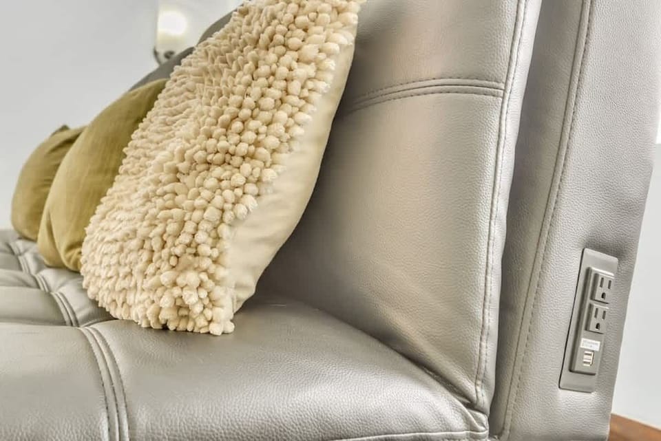 Living room with cozy seating—perfect for relaxing after a day of exploring.