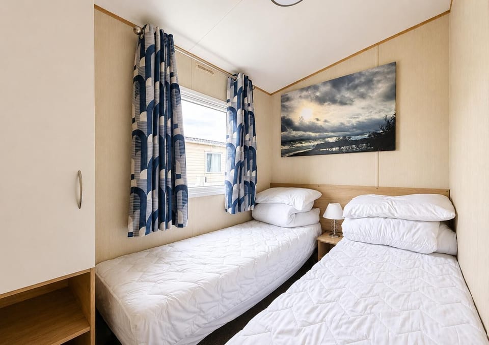 Create lasting memories on Suffolk beaches with a stay at Kessingland Beach Holiday Park Lowestoft, where caravan holidays offer cosy bedrooms in for ultimate comfort.