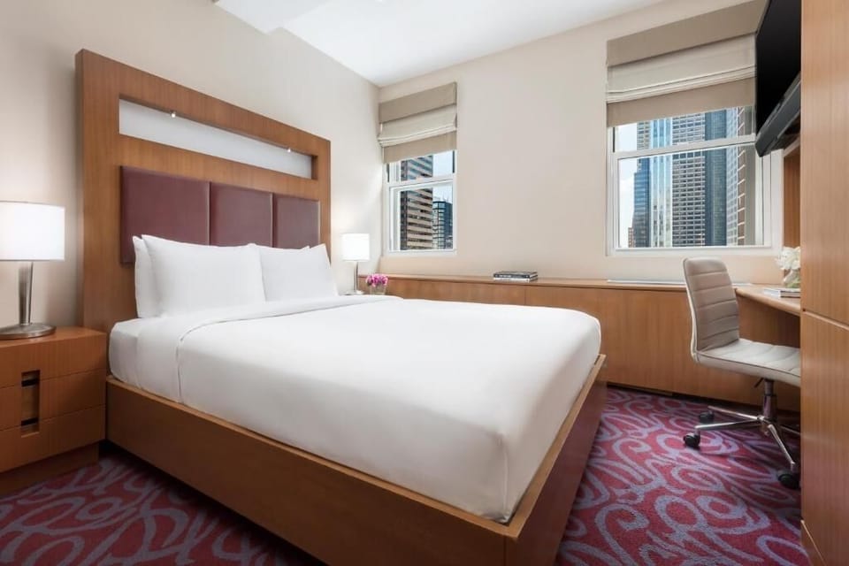Stretch out on crisp linens in a bright, quiet city room.