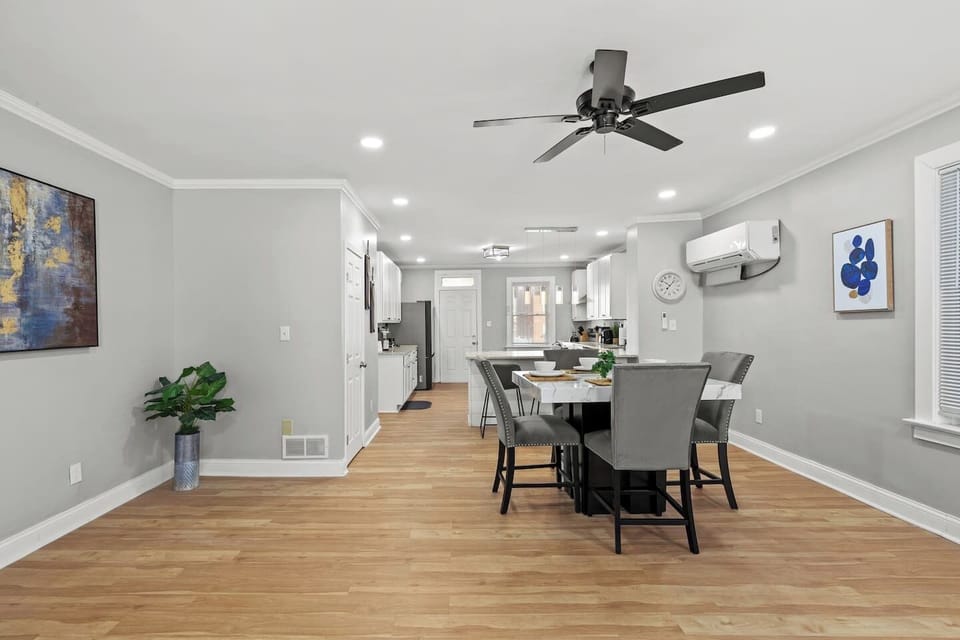 The spacious dining area is perfect for meals or game nights with friends.