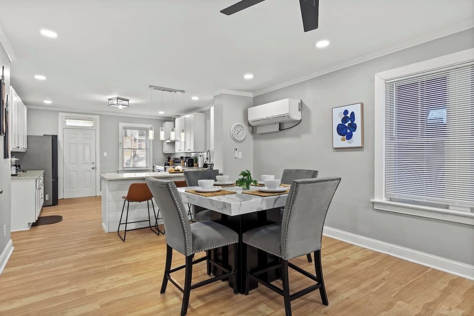 Spacious and stylish dining area, perfect for family meals or social gatherings.